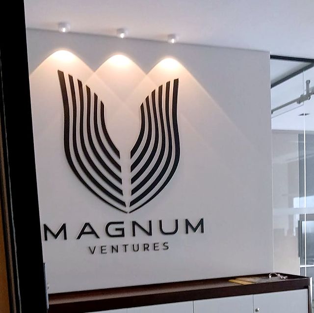 Black acrylic logo, uplit – Investment firm · cut-out acrylic with uplights