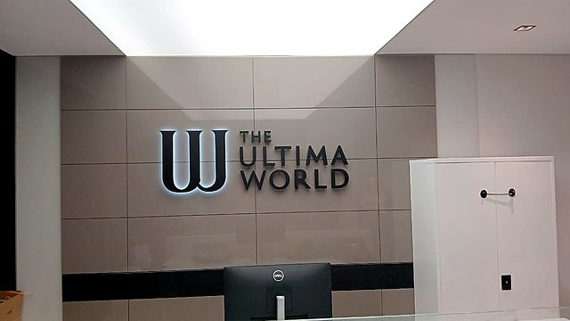 Halo-lit reception logo – Corporate office · lit 3D lettering