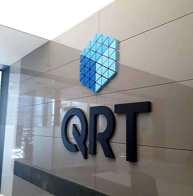 Colour-matched 3D logo, up close – Trading firm · powder-coated 3D acrylic